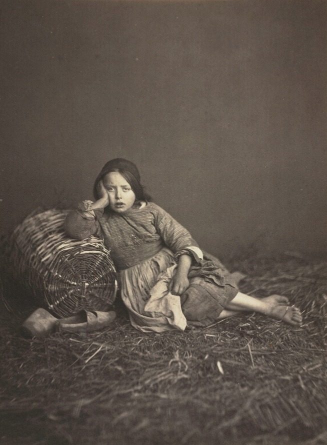 Young Girl Seated on Straw, Leaning on a Basket by Edmond Bacot (French, 1814–1875)