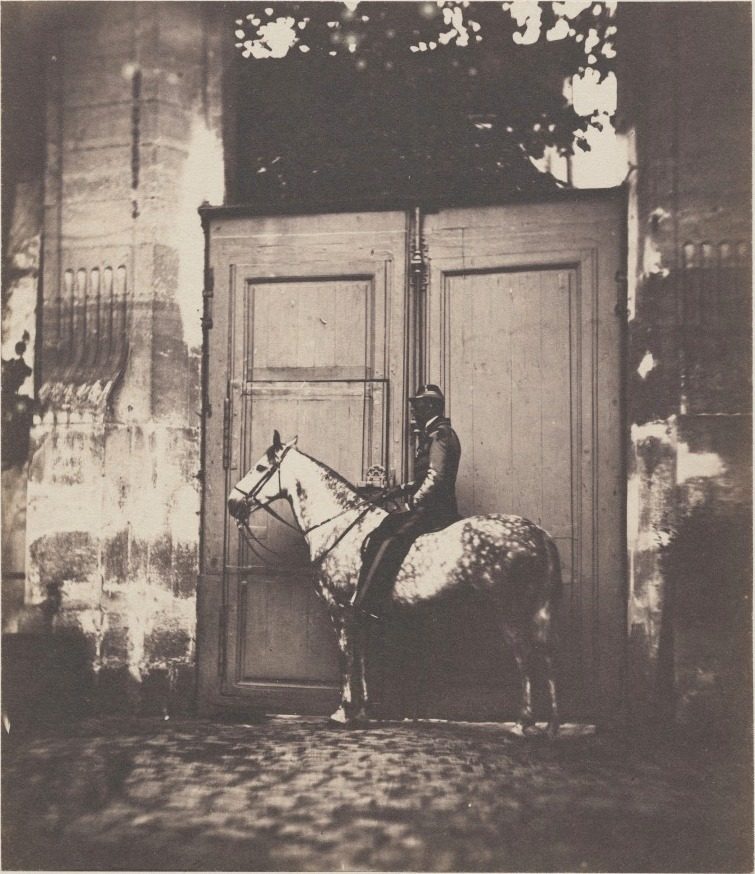Black Horseman in Front of a Doorway